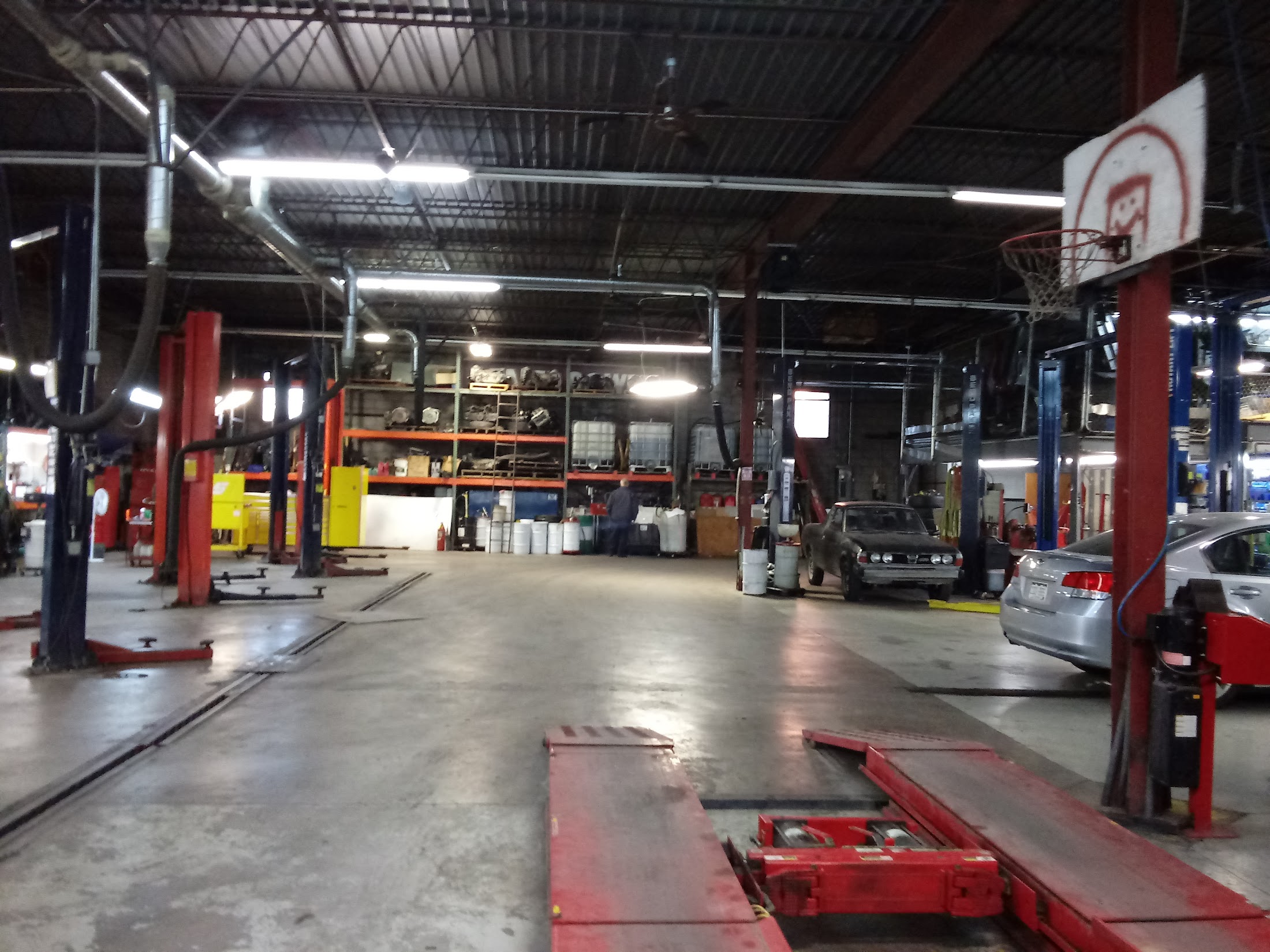 Strictly Automotive repair bays with lifts and shop equipment