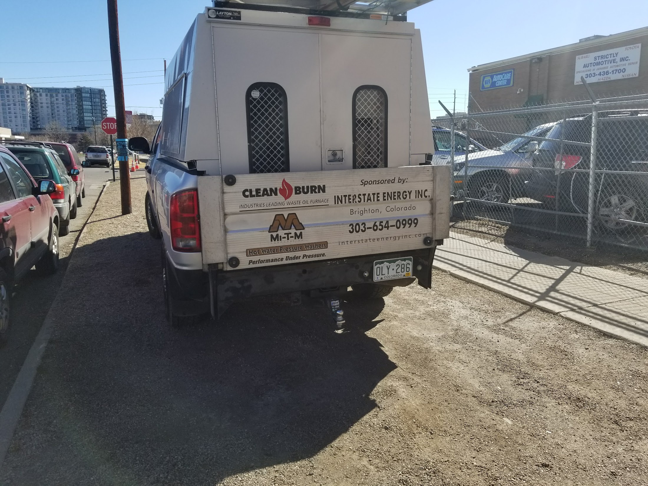 Vehicles lined up outside Strictly Automotive